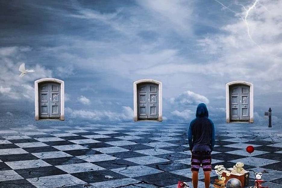 A figure, viewed from behind, is look at doors in the clouds.
